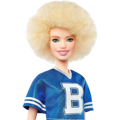 Barbie Fashionistas Puppe im blauen Glitzeroberteil und Rock, mit Karomuster