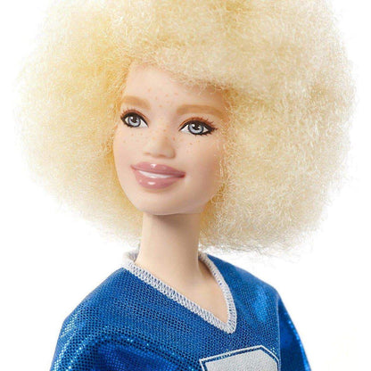 Barbie Fashionistas Puppe im blauen Glitzeroberteil und Rock, mit Karomuster